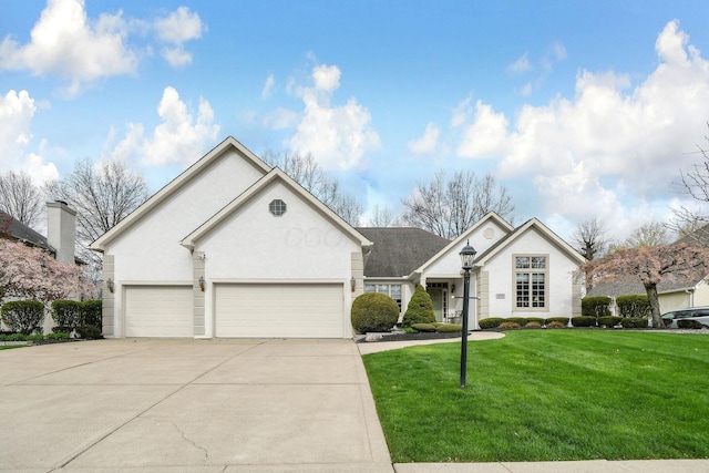 12372 Brook Forest Cir NW, Pickerington, OH 43147 - single story home featuring concrete driveway, stucco siding, a front lawn, and a garage