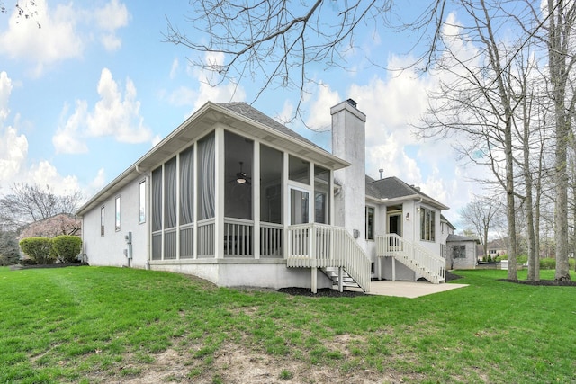 12372 Brook Forest Cir NW, Pickerington, OH 43147 - back of property featuring a yard, a sunroom, and a chimney