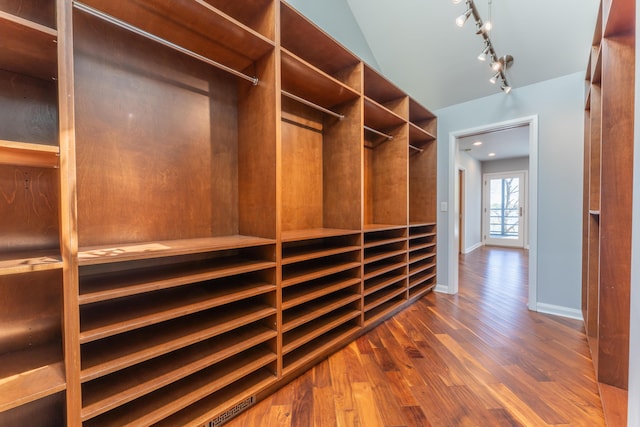 spacious closet with wood finished floors