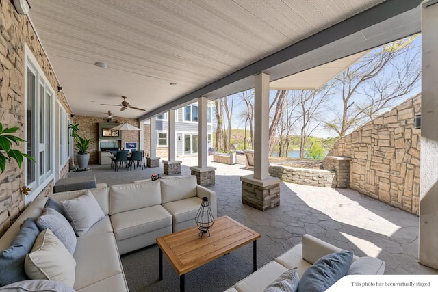 29740 Blosser Rd, Logan, OH 43138 - view of patio / terrace with outdoor lounge area, outdoor dining space, a water view, and a ceiling fan