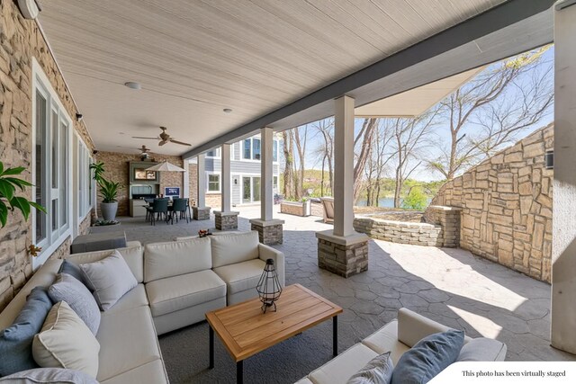 29740 Blosser Rd, Logan, OH 43138 - view of patio / terrace with outdoor lounge area, outdoor dining space, a water view, and a ceiling fan