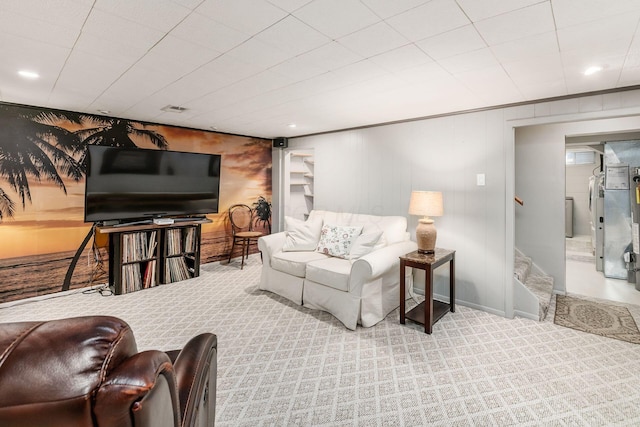 living area featuring recessed lighting, visible vents, carpet, and stairs