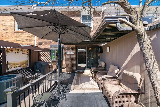 view of patio with central AC