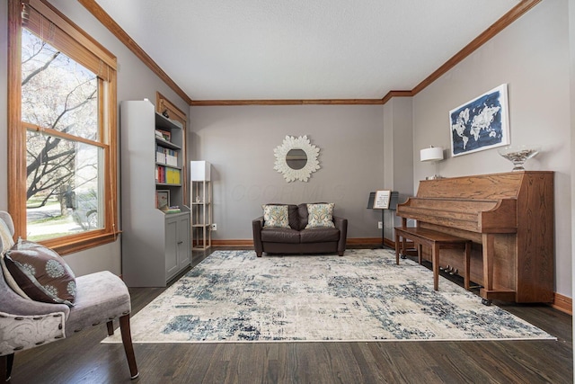 6707 Meadow Glen Dr S, Westerville, OH 43082 - living area featuring wood finished floors, a healthy amount of sunlight, baseboards, and ornamental molding