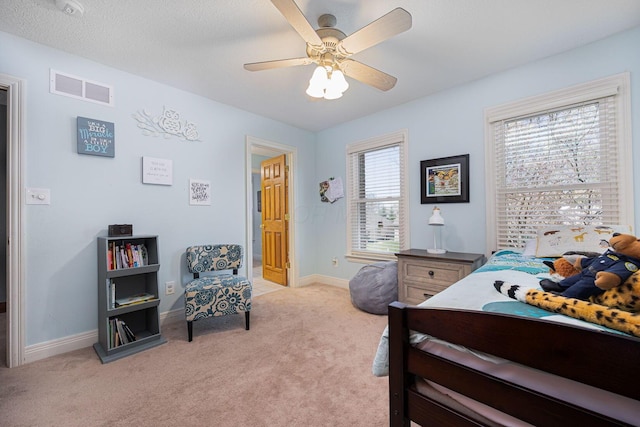 6707 Meadow Glen Dr S, Westerville, OH 43082 - bedroom featuring visible vents, a ceiling fan, baseboards, and light carpet