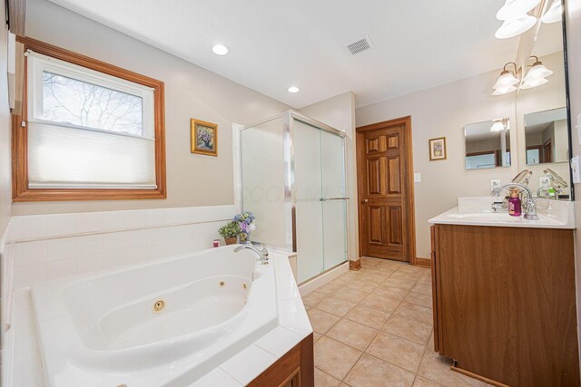 6707 Meadow Glen Dr S, Westerville, OH 43082 - full bath featuring a shower stall, tile patterned floors, a whirlpool tub, visible vents, and vanity