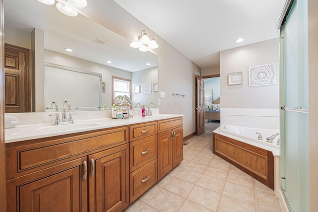 6707 Meadow Glen Dr S, Westerville, OH 43082 - ensuite bathroom with tile patterned floors, a sink, a bath, double vanity, and visible vents