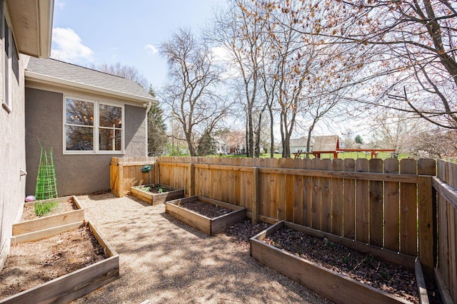 6707 Meadow Glen Dr S, Westerville, OH 43082 - view of yard with a fenced backyard and a vegetable garden