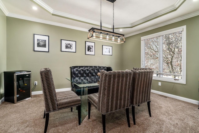 478 Riverbend Ave, Powell, OH 43065 - dining room with a tray ceiling, visible vents, carpet floors, crown molding, and baseboards