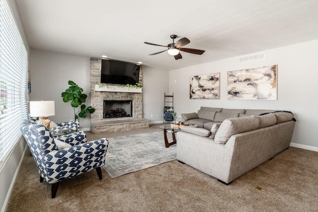 478 Riverbend Ave, Powell, OH 43065 - carpeted living room with a fireplace, visible vents, a ceiling fan, and baseboards