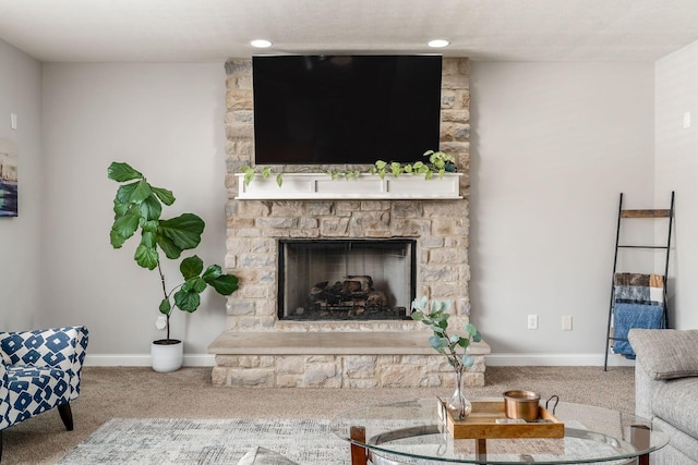 478 Riverbend Ave, Powell, OH 43065 - living room with a stone fireplace, baseboards, and carpet