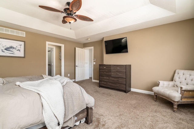 478 Riverbend Ave, Powell, OH 43065 - carpeted bedroom with ceiling fan, baseboards, visible vents, and a raised ceiling
