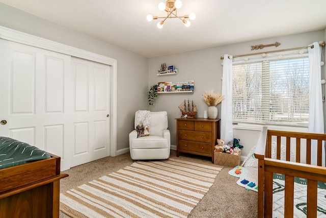 478 Riverbend Ave, Powell, OH 43065 - bedroom featuring a closet, a notable chandelier, and carpet