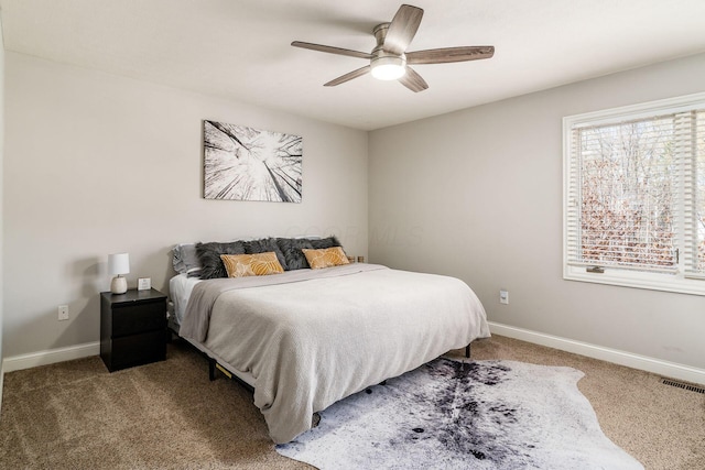 478 Riverbend Ave, Powell, OH 43065 - carpeted bedroom with baseboards, a ceiling fan, and visible vents