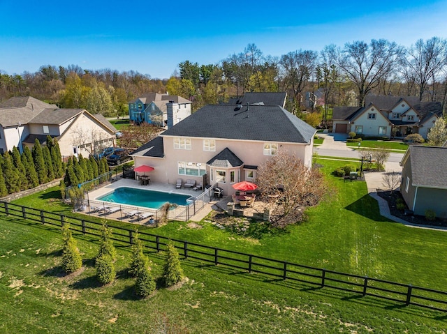 478 Riverbend Ave, Powell, OH 43065 - view of swimming pool with a patio area, a lawn, a fenced backyard, a fenced in pool, and a residential view