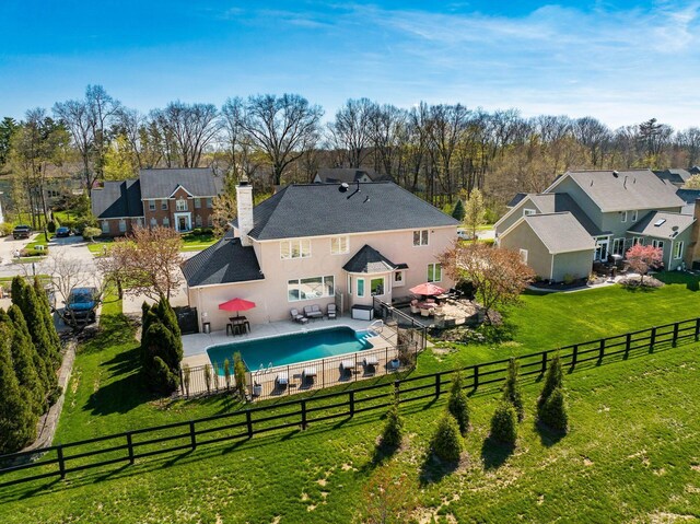 478 Riverbend Ave, Powell, OH 43065 - view of pool featuring a lawn, a residential view, a patio area, and a fenced backyard