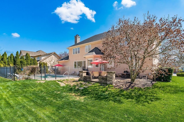 478 Riverbend Ave, Powell, OH 43065 - rear view of property with a fenced in pool, fence, a lawn, a patio, and stucco siding