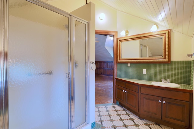115 E Wheeling St, Lancaster, OH 43130 - bathroom with lofted ceiling, a stall shower, vanity, and tile patterned flooring