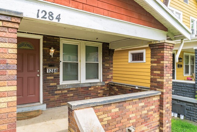 1282-1284 Linwood Ave, Columbus, OH 43206 - property entrance with brick siding and covered porch