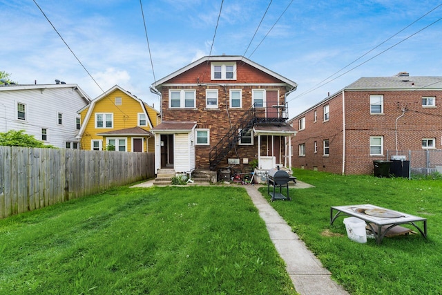 1282-1284 Linwood Ave, Columbus, OH 43206 - back of house with a yard and a fenced backyard