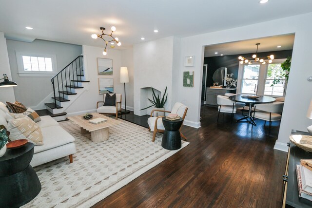 568 Cline St, Columbus, OH 43206 - living room featuring wood finished floors, a chandelier, and recessed lighting