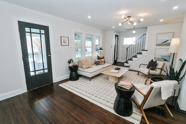 568 Cline St, Columbus, OH 43206 - living room with baseboards, recessed lighting, a notable chandelier, wood finished floors, and stairway