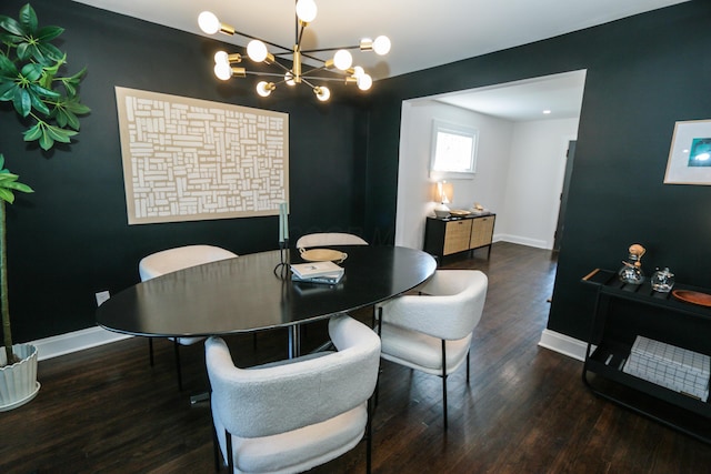 568 Cline St, Columbus, OH 43206 - dining space with wood finished floors, baseboards, and a notable chandelier