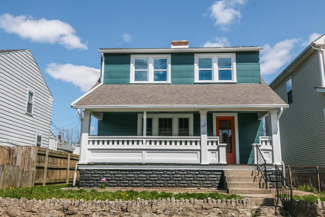 568 Cline St, Columbus, OH 43206 - traditional style home with a chimney, fence, a shingled roof, and covered porch