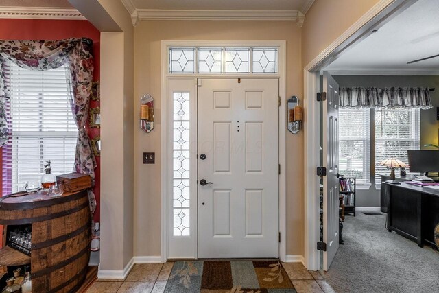 8181 Trail Lake Dr, Powell, OH 43065 - foyer entrance featuring light carpet, baseboards, and ornamental molding