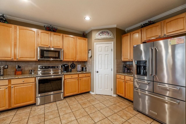 8181 Trail Lake Dr, Powell, OH 43065 - kitchen with light stone counters, stainless steel appliances, ornamental molding, light tile patterned floors, and decorative backsplash