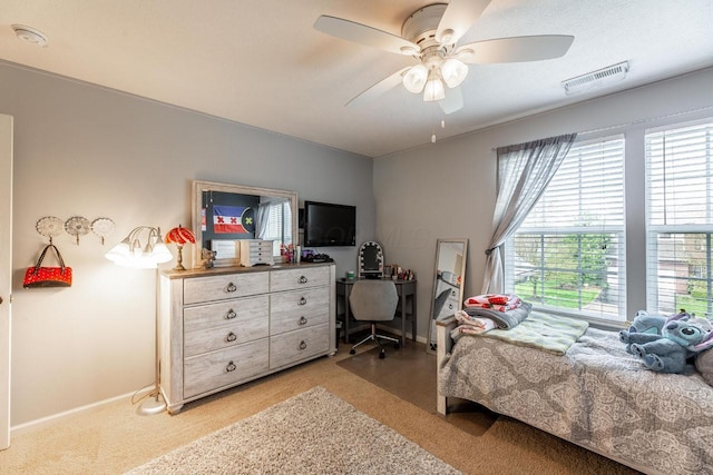 8181 Trail Lake Dr, Powell, OH 43065 - bedroom featuring baseboards, visible vents, light colored carpet, and ceiling fan