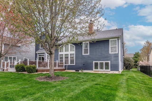 8181 Trail Lake Dr, Powell, OH 43065 - back of house with a chimney, roof with shingles, a yard, and a deck