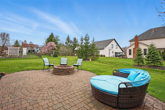 view of patio / terrace featuring a fire pit