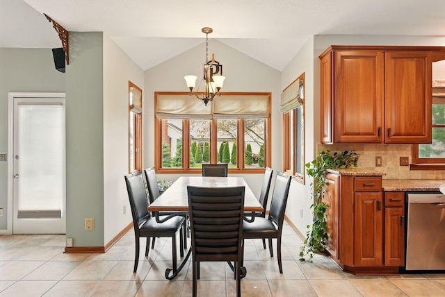 dining room featuring baseboards, an inviting chandelier, vaulted ceiling, and light tile patterned floors