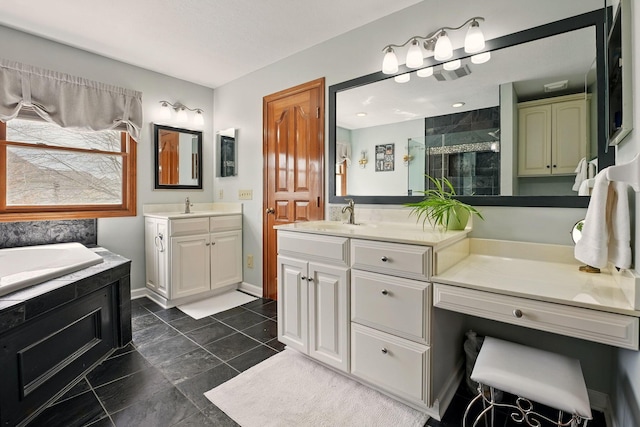 full bath featuring a garden tub, two vanities, a sink, and a stall shower