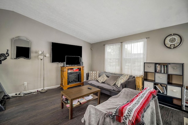 2495 Hingham Ln, Columbus, OH 43224 - living room with lofted ceiling, wood finished floors, and baseboards
