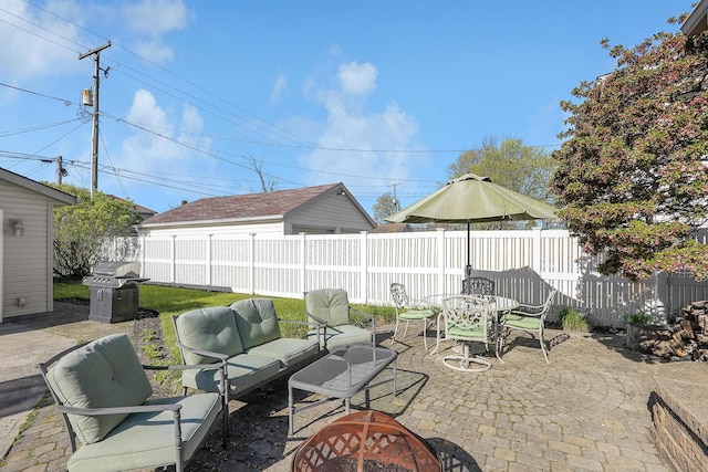117 Fairfield Ave, Newark, OH 43055 - view of patio with outdoor dining area, a grill, a fenced backyard, and an outdoor hangout area