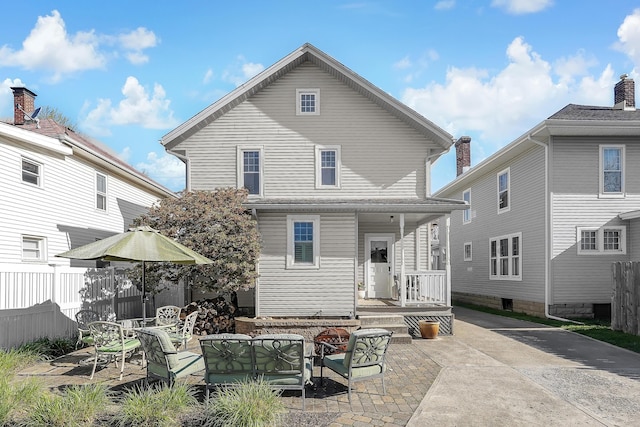 117 Fairfield Ave, Newark, OH 43055 - back of property featuring an outdoor living space, fence, and a patio