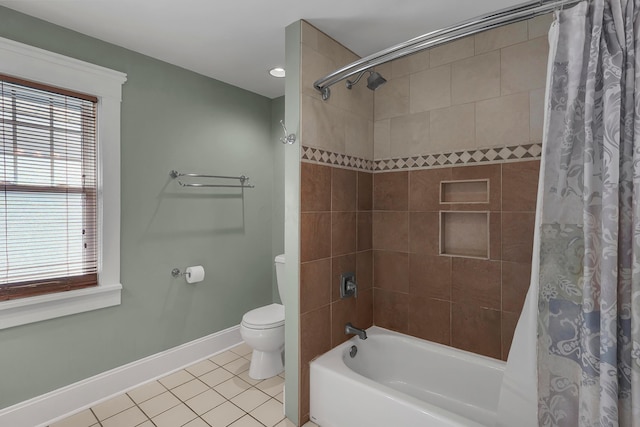 117 Fairfield Ave, Newark, OH 43055 - bathroom with baseboards, toilet, tile patterned flooring, and a wealth of natural light