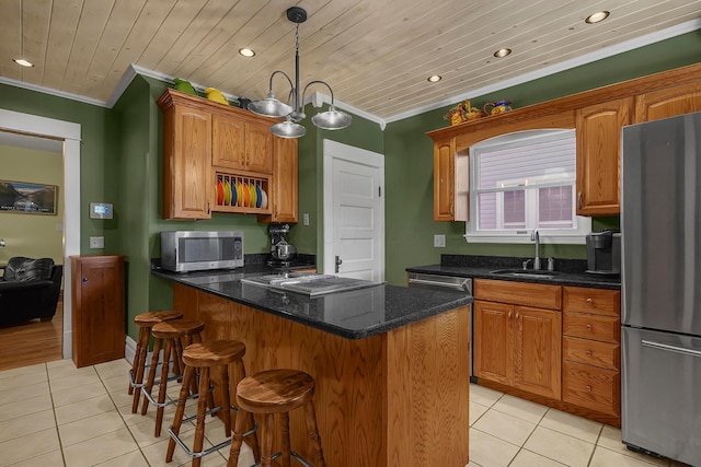 117 Fairfield Ave, Newark, OH 43055 - kitchen with crown molding, a sink, light tile patterned floors, appliances with stainless steel finishes, and recessed lighting