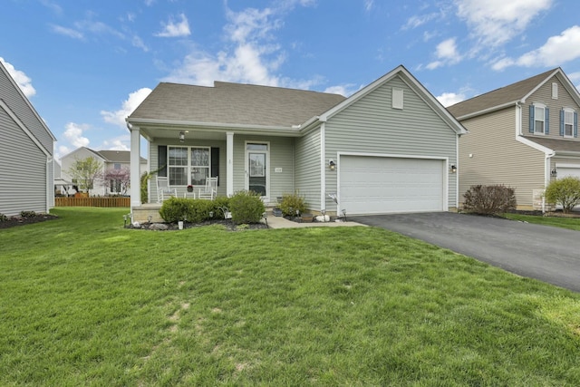 114 Hummock Dr, Etna, OH 43062 - view of front of house with aphalt driveway, a shingled roof, an attached garage, a porch, and a front yard
