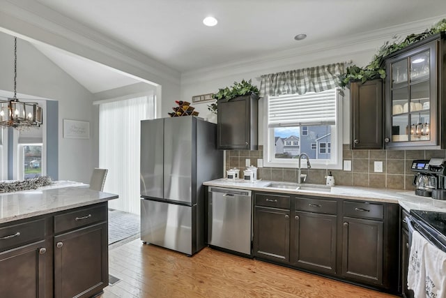 114 Hummock Dr, Etna, OH 43062 - kitchen featuring a notable chandelier, dark brown cabinetry, stainless steel appliances, and a sink