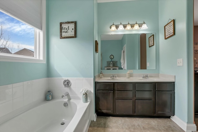 114 Hummock Dr, Etna, OH 43062 - bathroom featuring a bath, tile patterned flooring, a sink, and double vanity