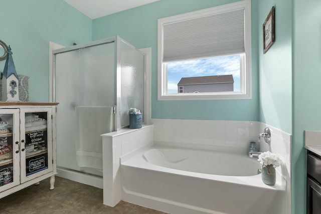 114 Hummock Dr, Etna, OH 43062 - bathroom with a bath, vanity, tile patterned flooring, and a shower stall