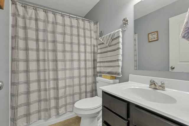 114 Hummock Dr, Etna, OH 43062 - bathroom featuring toilet, vanity, tile patterned floors, and shower / bath combo with shower curtain