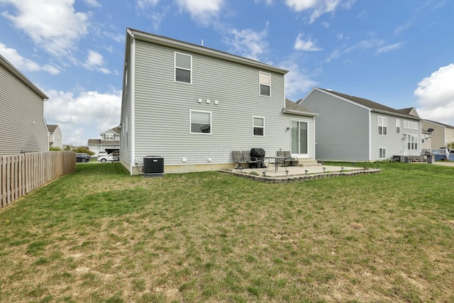 114 Hummock Dr, Etna, OH 43062 - rear view of house with a patio area, central air condition unit, a lawn, fence, and entry steps