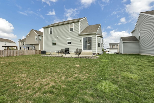 114 Hummock Dr, Etna, OH 43062 - back of house featuring a yard, fence, a patio area, and entry steps