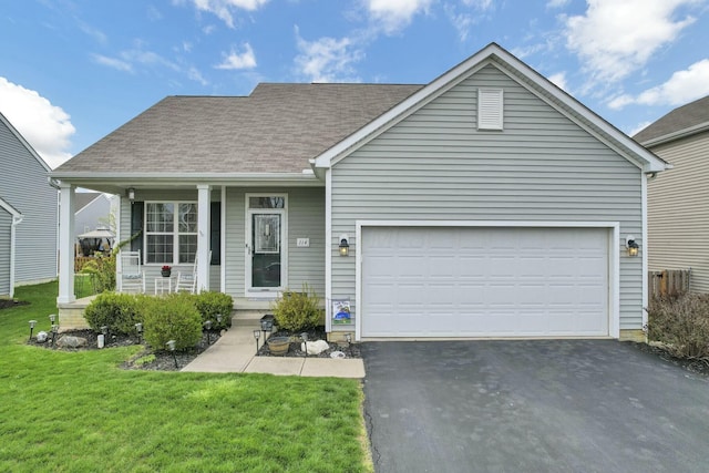 114 Hummock Dr, Etna, OH 43062 - view of front of house featuring aphalt driveway, a shingled roof, an attached garage, a porch, and a front yard