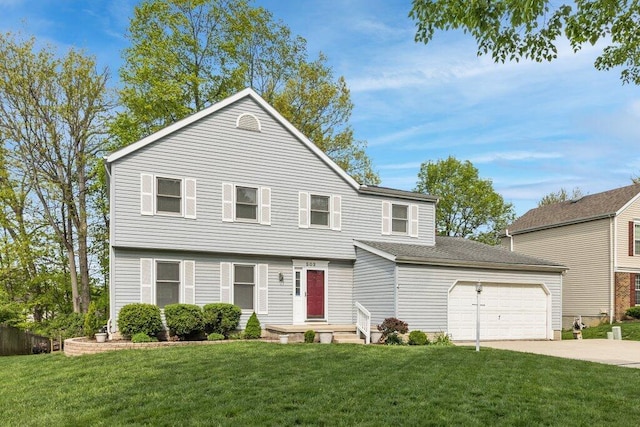 view of front of property with driveway, a garage, and a front lawn