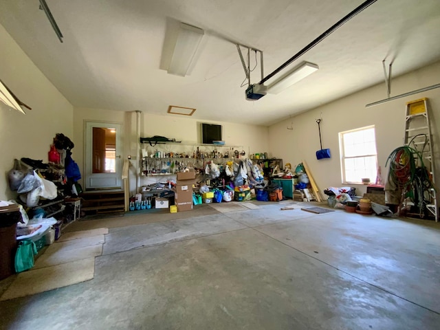 garage featuring a garage door opener